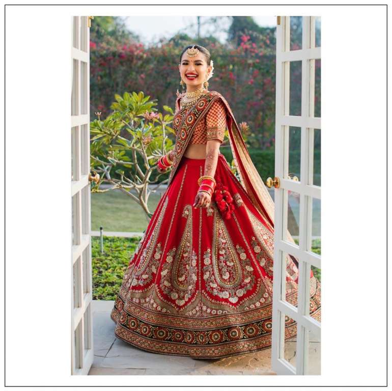 The Sabyasachi Bride Wore A Multi-Coloured Lehenga And Donned It With A  Rajwada Style 'Dupatta'