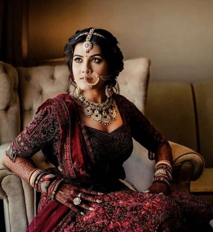 Photo of wine and gold embellished bridal lehenga | Wedding lehenga  designs, Fashion illustration dresses, Indian bridal wear