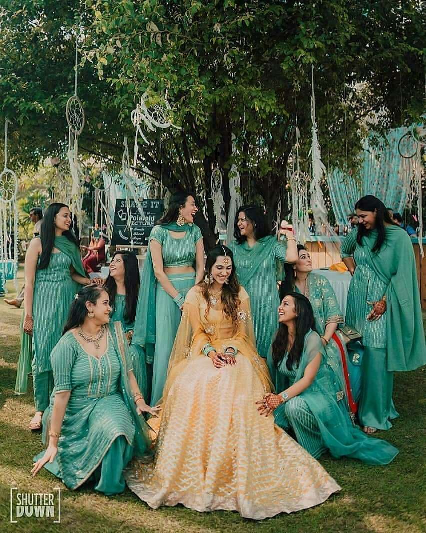 bridesmaids photograph green ceremony