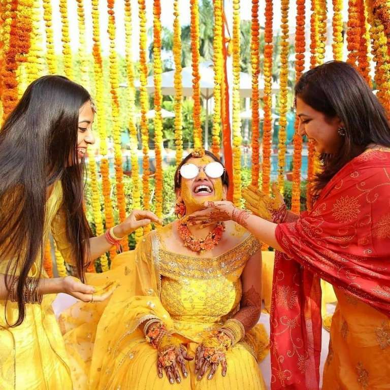 Rituals - Haldi Ceremony Photos, Hindu Culture, Orange Color, Wedding  Rituals, Group Photo… | Haldi ceremony, Wedding couple poses photography,  Wedding photo albums
