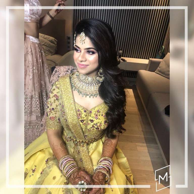 Photo of Makeup with yellow and red lehenga with dupatta